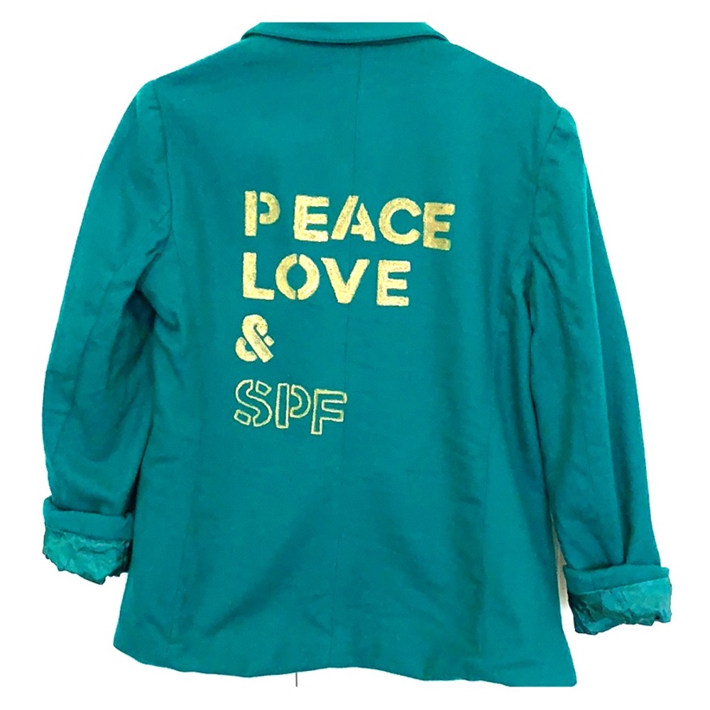 Upcycled “peace, love & SPF” blazer